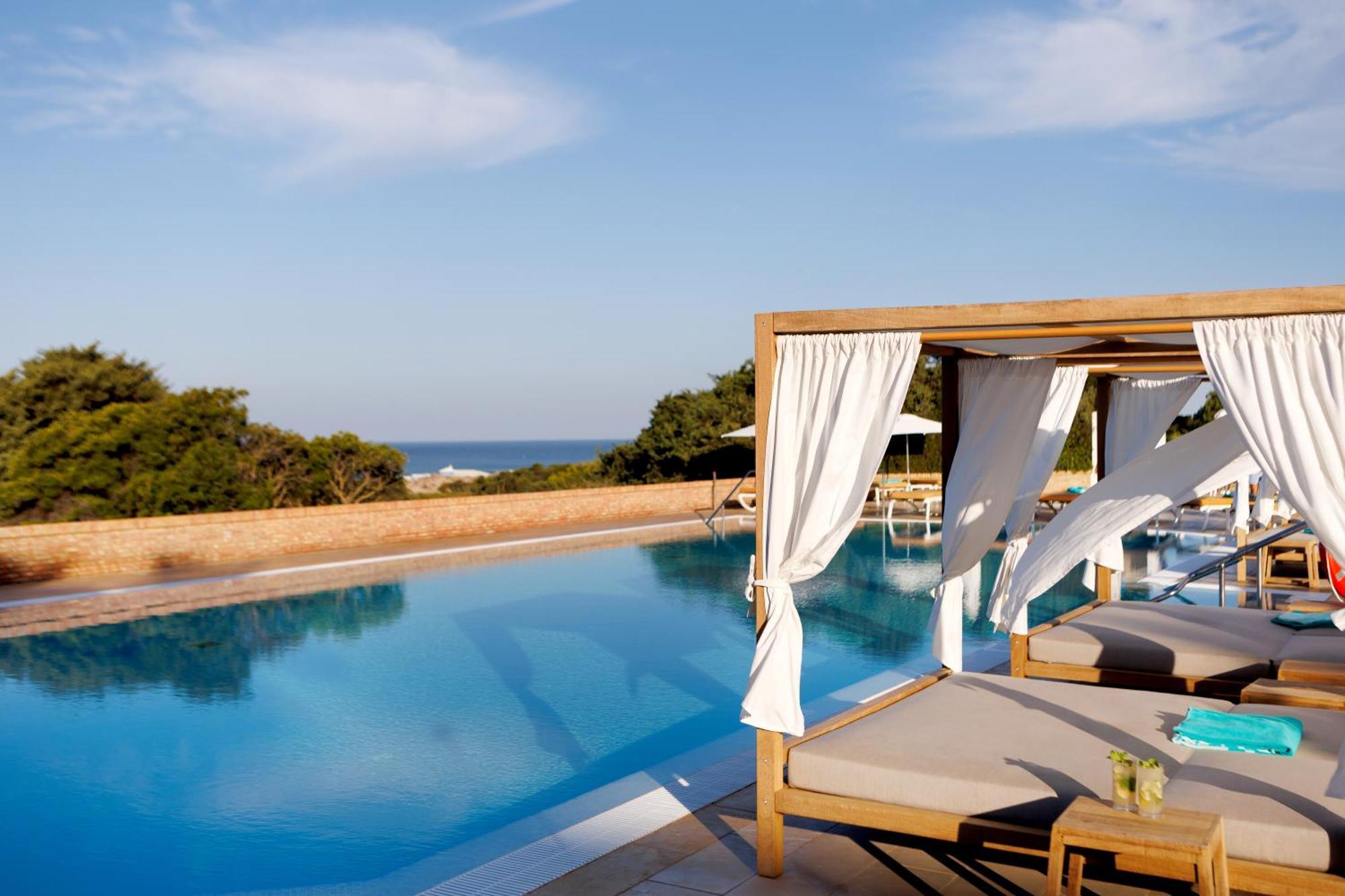 Iberostar Selection Andalucia Playa Hotel Chiclana de la Frontera Kültér fotó The pool at the Mykonos Grand Resort